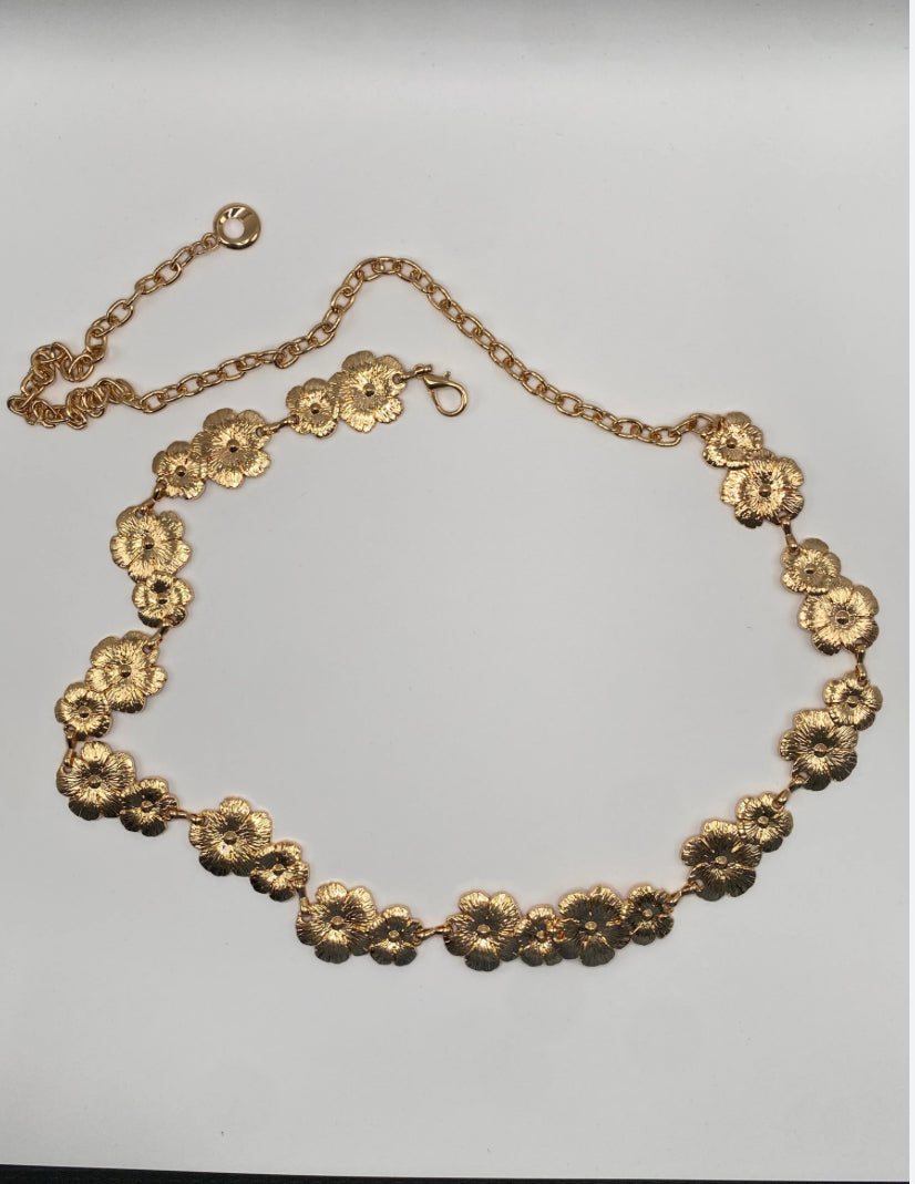 cinturón de cadena con flores